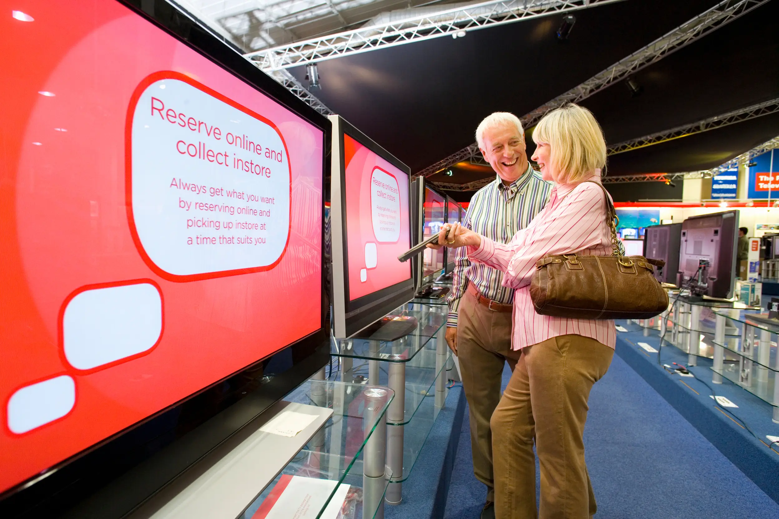 senior-couple-standing-in-the-middle-of-an-electro-2026-01-11-08-40-02-utc (1)